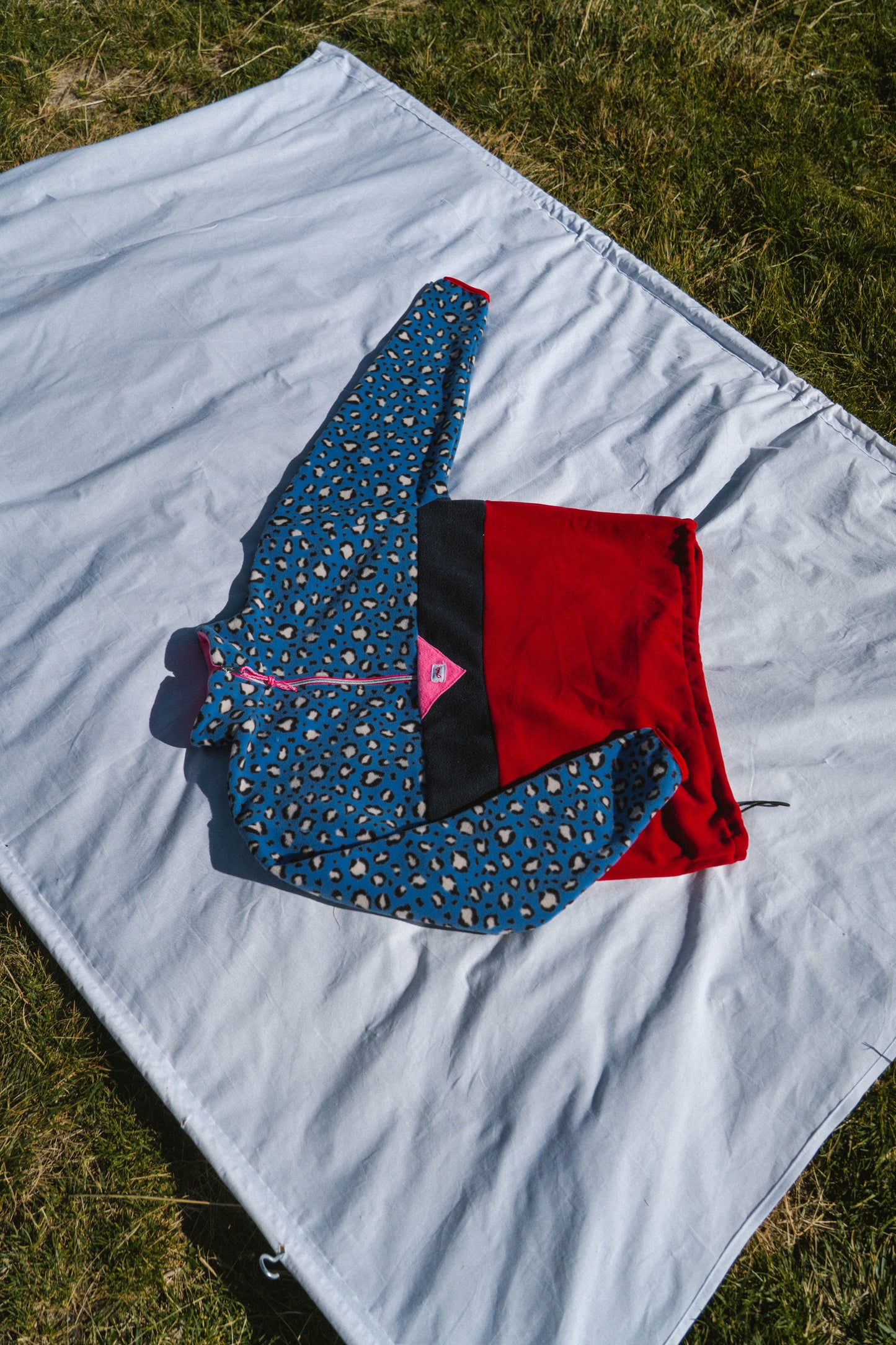 précommande polaire bleu leo x rouge